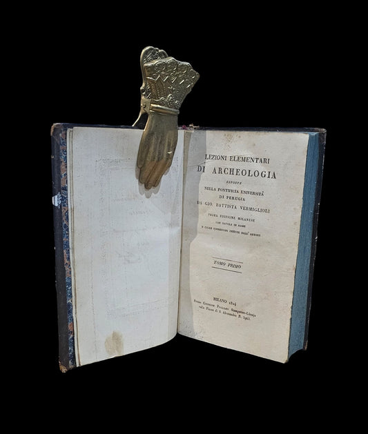 Lezioni elementari di archeologia esposte nella pontificia Università di Perugia. Prima edizione milanese colle correzioni inedite dell’Autore