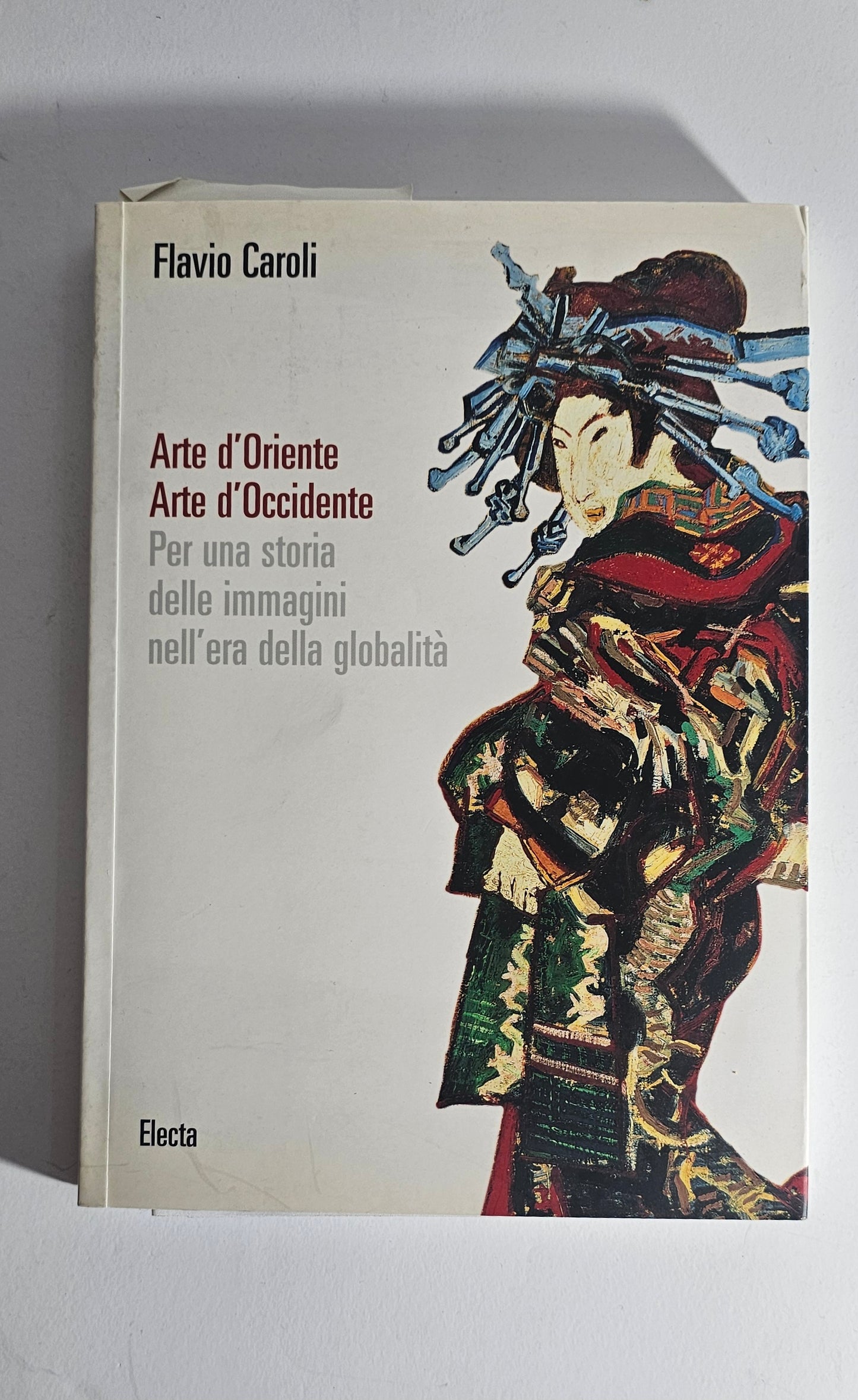 Libro Flavio Caroli Arte Oriente Occidente Electa copertina
