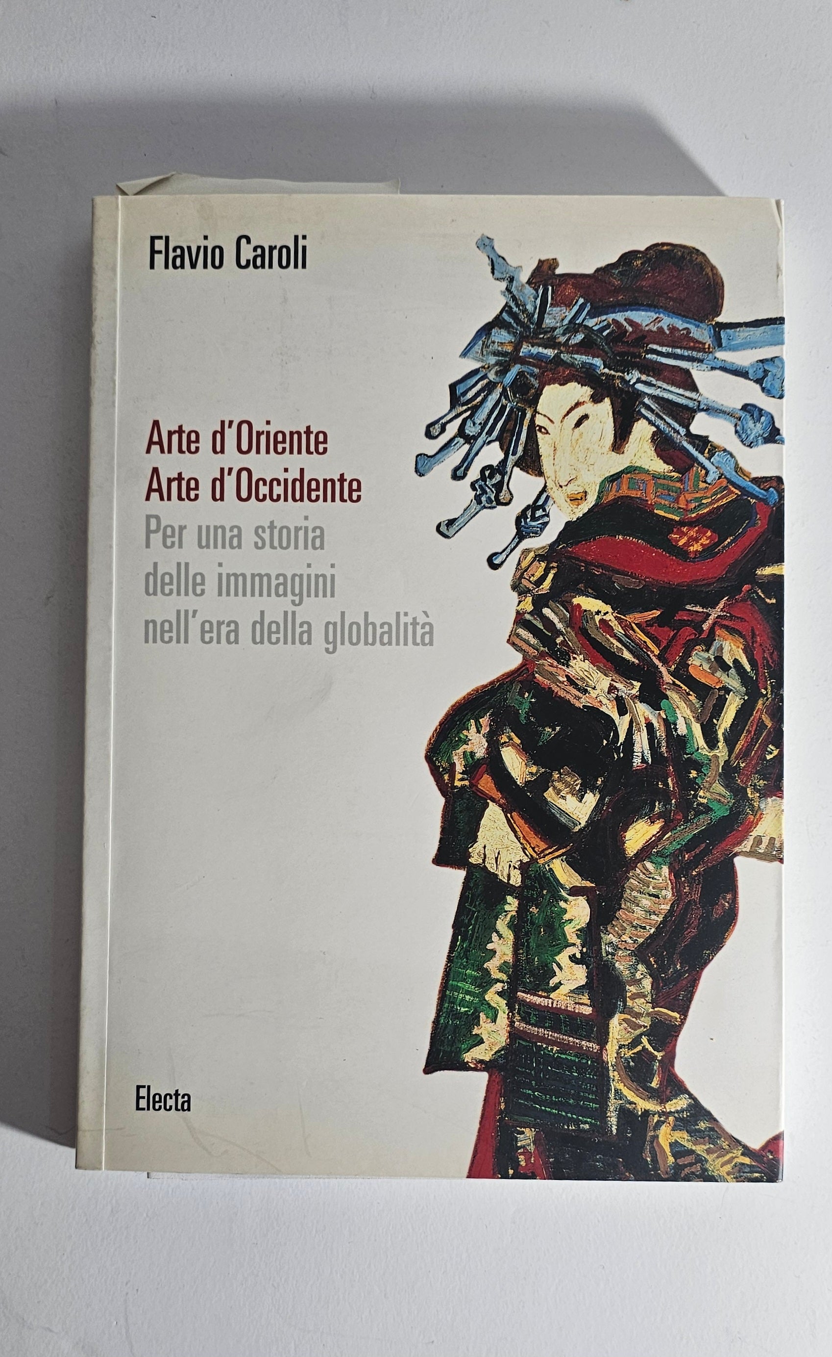 Libro Flavio Caroli Arte Oriente Occidente Electa copertina
