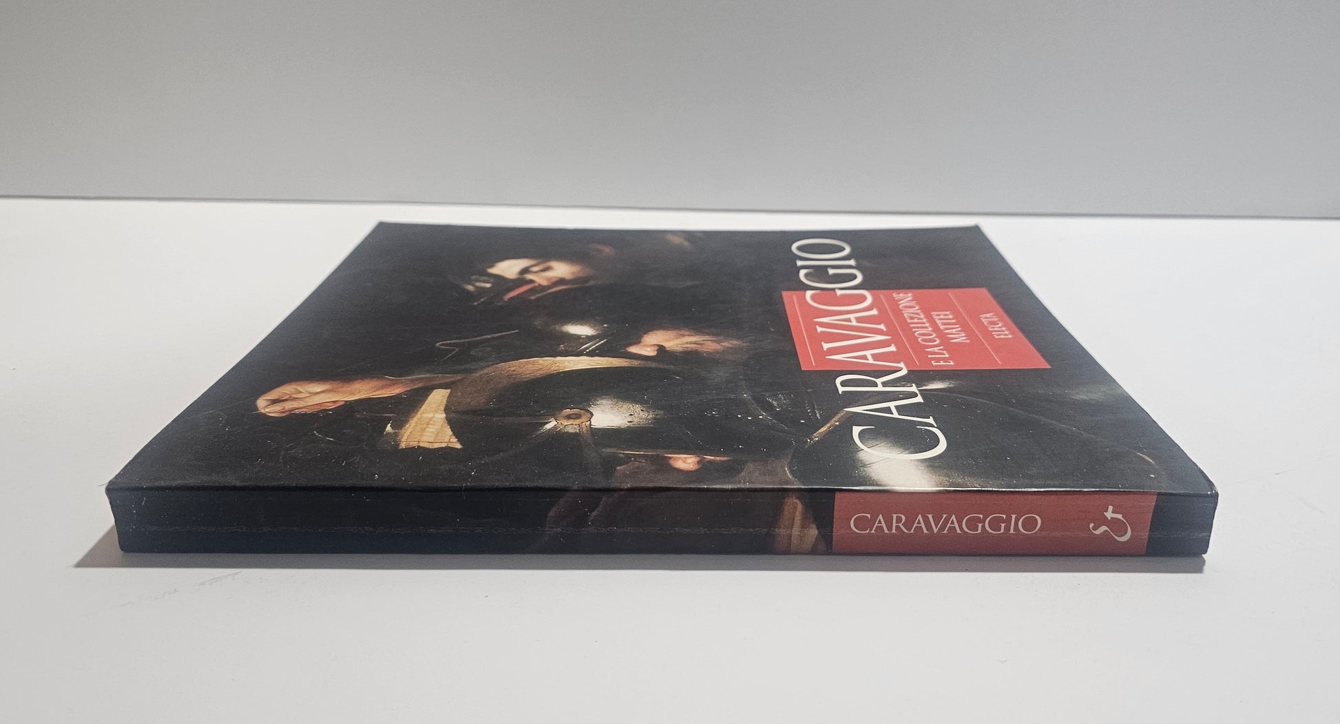 Libro Caravaggio Electa vista laterale