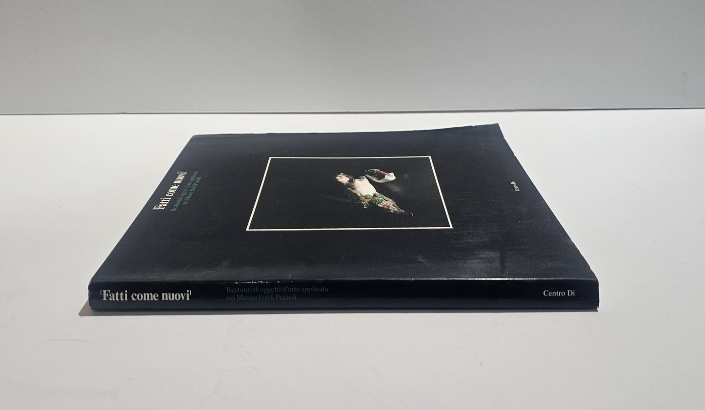 Dorso libro Fatti come nuovi catalogo mostra restauro