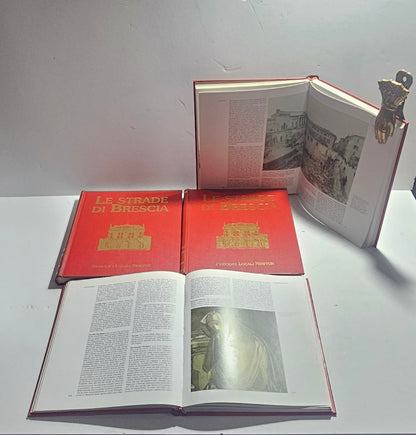 Volumi aperti con pagine illustrate dedicate alla storia urbana di Brescia iolibrocarmine