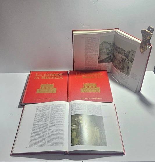 Volumi aperti con pagine illustrate dedicate alla storia urbana di Brescia iolibrocarmine